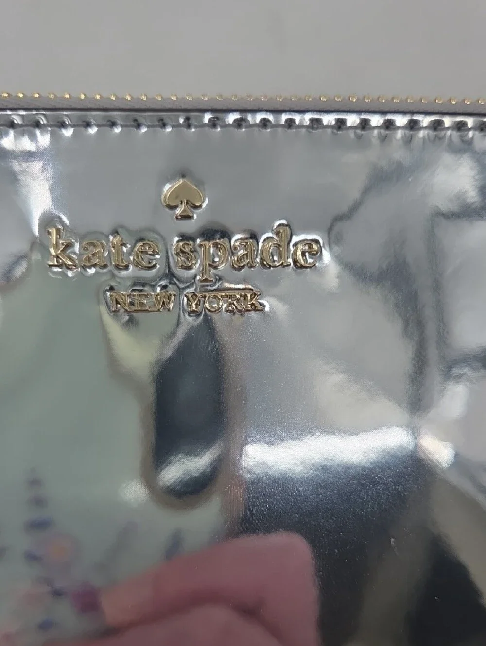 kate spade Metallic Silver Zip Wristlet